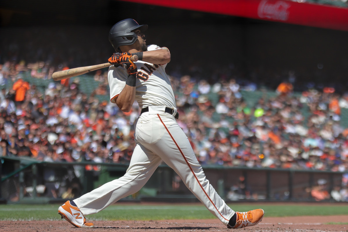 SF Giants left fielder LaMonte Wade Jr. swings for the fences at Oracle Park (2023).